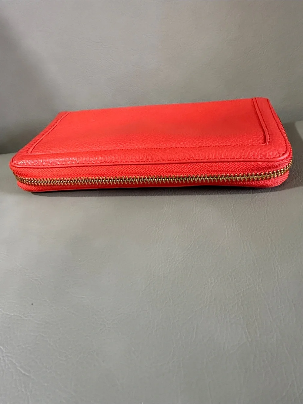 Tory Burch orange Pebbled Leather Zip Wallet with Gold Logo